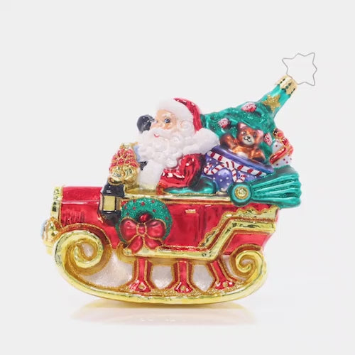 Video - Ornament Description - Ready to Ride Santa: Beep beep! Santa's droptop sleigh-mobile is modeled after a vintage car. He'll have no problem getting through the snowy night in this sweet ride! This video shows the ornament spinning slowly. 