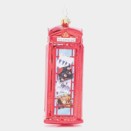 Video - Ornament Description - Ringing With Records: Ring Ring! Pick up this classic London phone booth plastered with Beatles album art and add some retro flair to your tree. This video shows the ornament spinning slowly. 