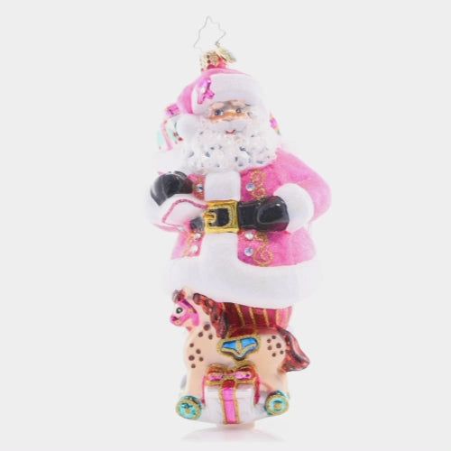 Video - Ornament Description - Think Pink Santa: Pink is stronger than you think! Santa will always support those near and dear to us in honor of breast cancer awareness. A percentage of sales from this special ornament will benefit Breast Cancer Research. This video shows the ornament spinning slowly. 