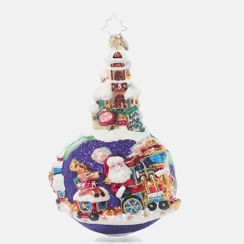 Video - Ornament Description - Worldwide Train Ride: Choo choo! Christmastime is here! Santa has taken a break from flying through the sky to enjoy some time on land-traveling by train. This video shows the ornament spinning slowly. 