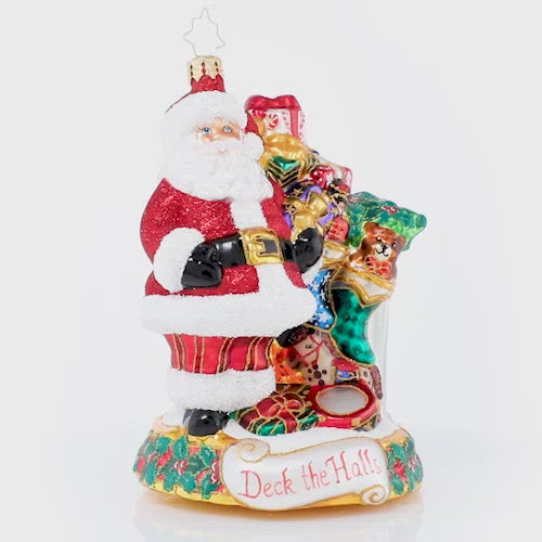 Video - Ornament Description - Masterpiece By The Mantle: The stockings were hung by the chimney with care, in hopes that Saint Nicholas soon would be there--and here he is! Santa takes care to fill each stocking with toys and treats to surprise and delight on Christmas morning. This video shows the ornament slowly spinning. 