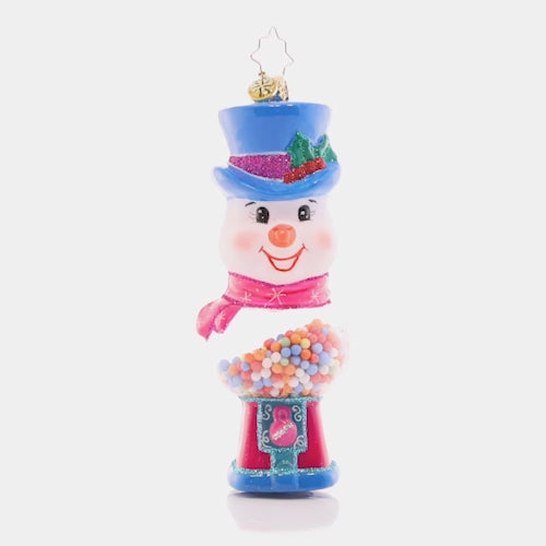 Video - Ornament Description - Gumball Grins: This jolly, top-hat wearing snow friend doubles as a classic gumball machine, ready to add a whimsical pop to your tree. This video shows the ornament slowly spinning. 